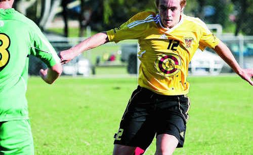 Angus Cochrane runs the ball forward before offloading in the weekend’s game. Angus Cochrane runs the ball forward before offloading in the weekend’s game.